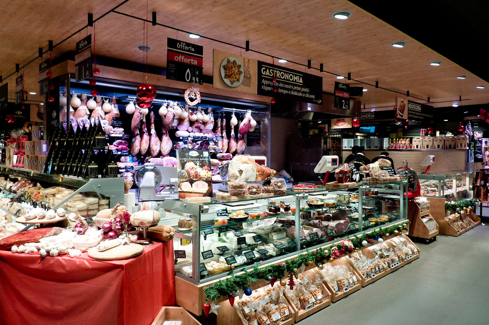 Ristrutturazione con rifacimento layout Carrefour Market modello Gourmet Como Traumfabrik studio associato Milano