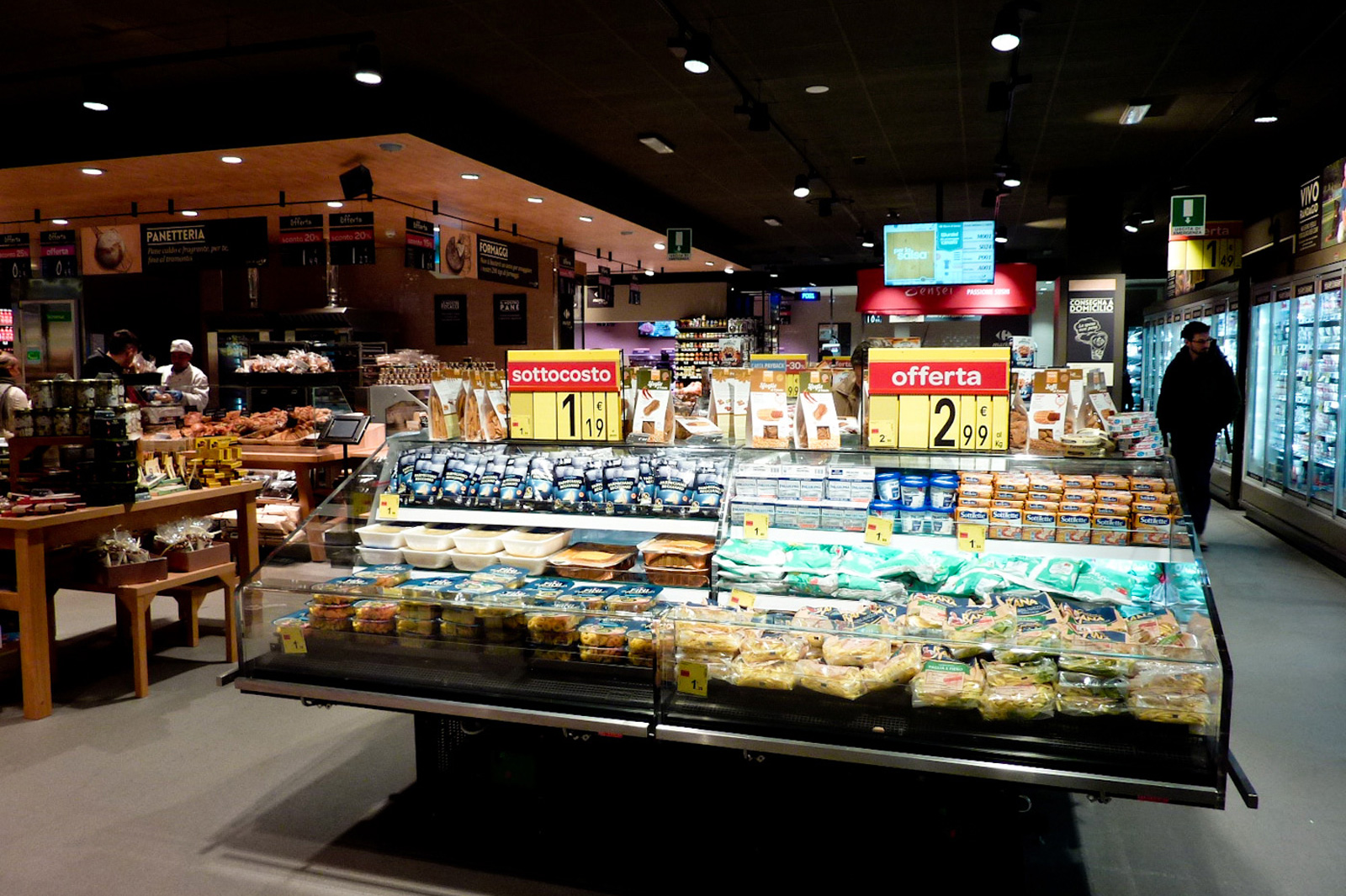 Ristrutturazione con rifacimento layout Carrefour Market modello Gourmet Como Traumfabrik studio associato Milano