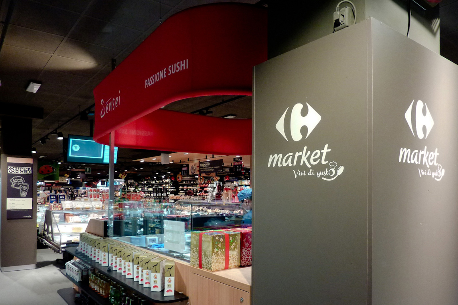 Ristrutturazione con rifacimento layout Carrefour Market modello Gourmet Como Traumfabrik studio associato Milano