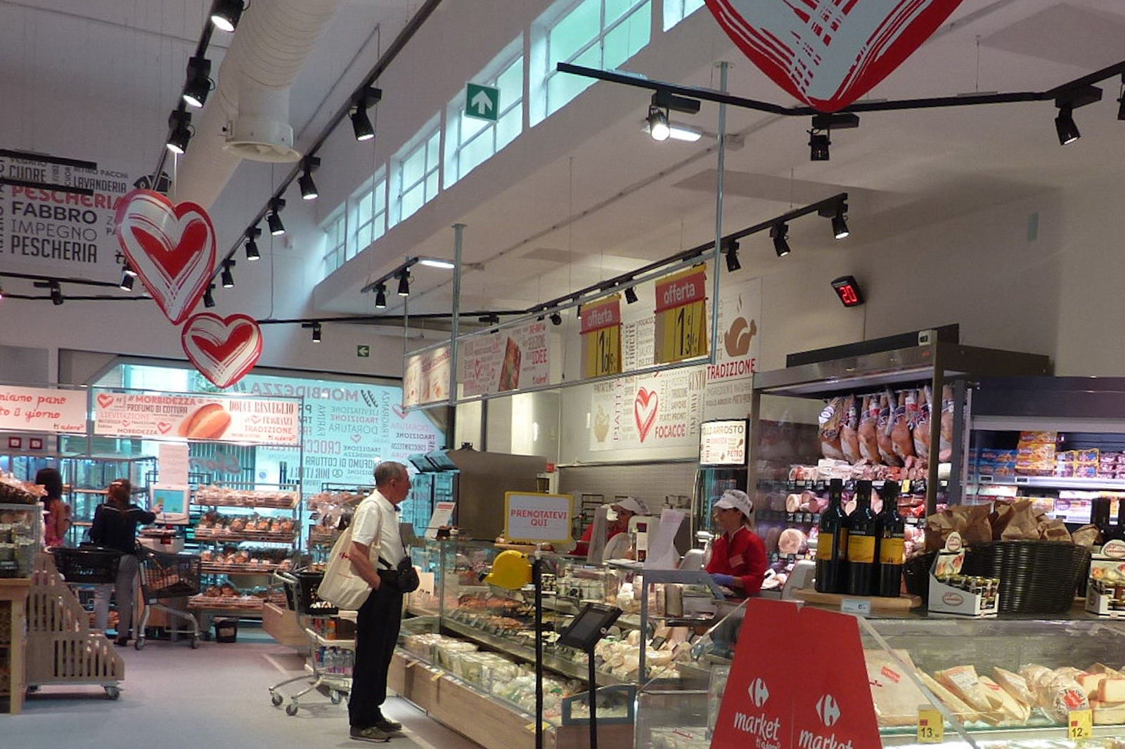 Ristrutturazione con rifacimento layout Carrefour Market modello Urbano Turati Torino Traumfabrik studio associato Milano